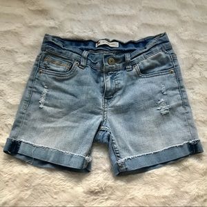 Levi’s light washed ripped jean shorts:)